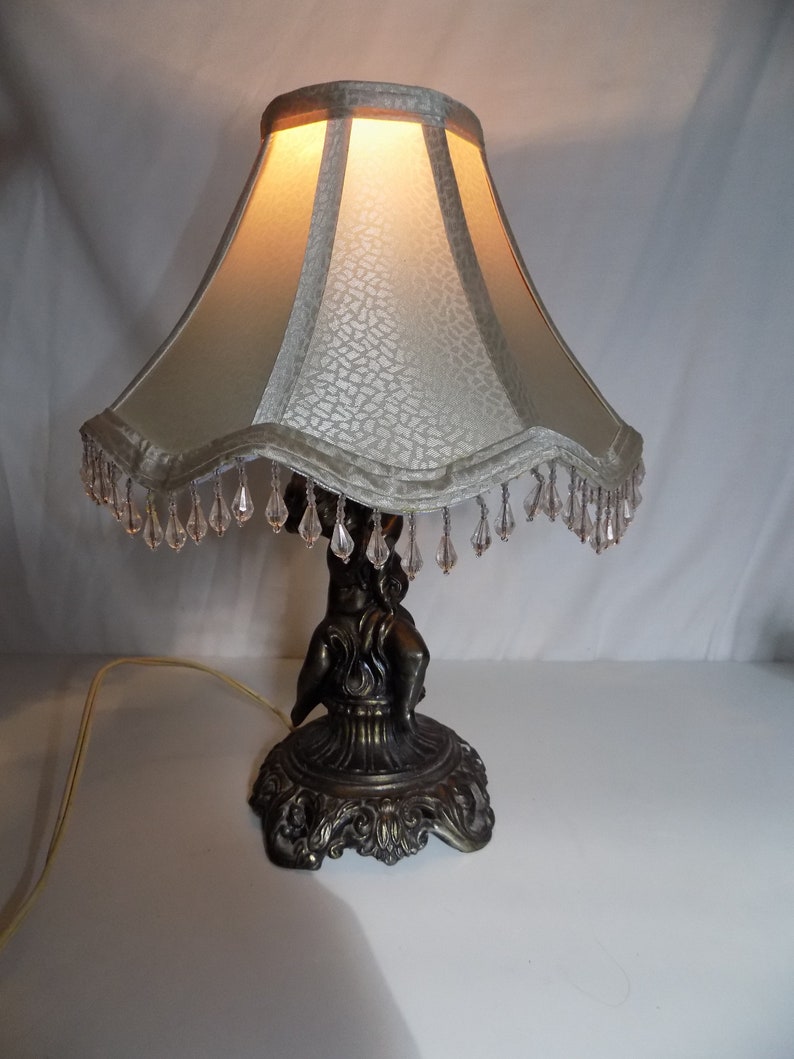 Vintage L Wmc Cherub Lamp 8713 Brass Globe Vintage L Wmc Cherub Lamp 8713 Brass Globe Image 0