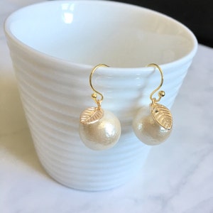 Cotton Pearl with leaf charm earrings,invisible clip on or gold filled hook, bridesmaid gift, friends gift, wedding jewelry, gift for her