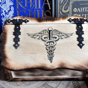 Caduceus. Medicine box. Wooden box for storage. Box for herbs. Box for crystals