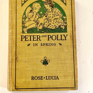 May include: Vintage book titled "Peter and Polly in Spring" by Rose Lucia. The cover is a light yellow with a green illustration of two children and a small animal. The book's title is in large black letters.