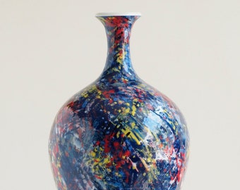 Russell Akerman Ceramic Art hand thrown studio pottery vase. Painted by Russell in an abstract multicolour slipware design.