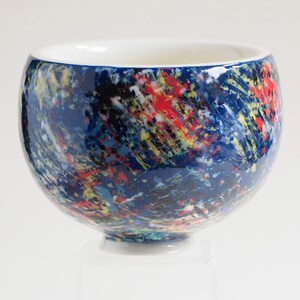 Russell Akerman Ceramic Art hand thrown studio pottery tea bowl. Painted by Russell in an abstract multicolour slipware design. image 2