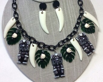 Witch Doctor Tiki Necklace or Necklace and Earring Set. 40s, 50s, 60s Style with Lucite Tikis, Skulls, Teeth, and Monstera Leaves. Pinup MCM