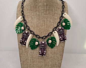 Witch Doctor Tiki Necklace with Tikis, Skulls, Monstera Leaves, and Claws. Luau 50s, 60s Retro Pinup MCM Jungle Princess Lucite Bakelite