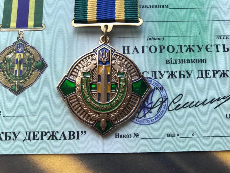 ордена россии на украине. орден ссср. орден мужества и герой россии. награды украины википедия. список награжденных украины.