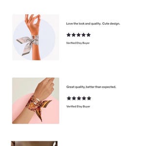 May include: A collection of four square silk scarves tied around wrists, featuring various patterns including floral, paisley, and abstract designs in vibrant colors like orange, green, pink, and white, each paired with a circular metal ring accessory.