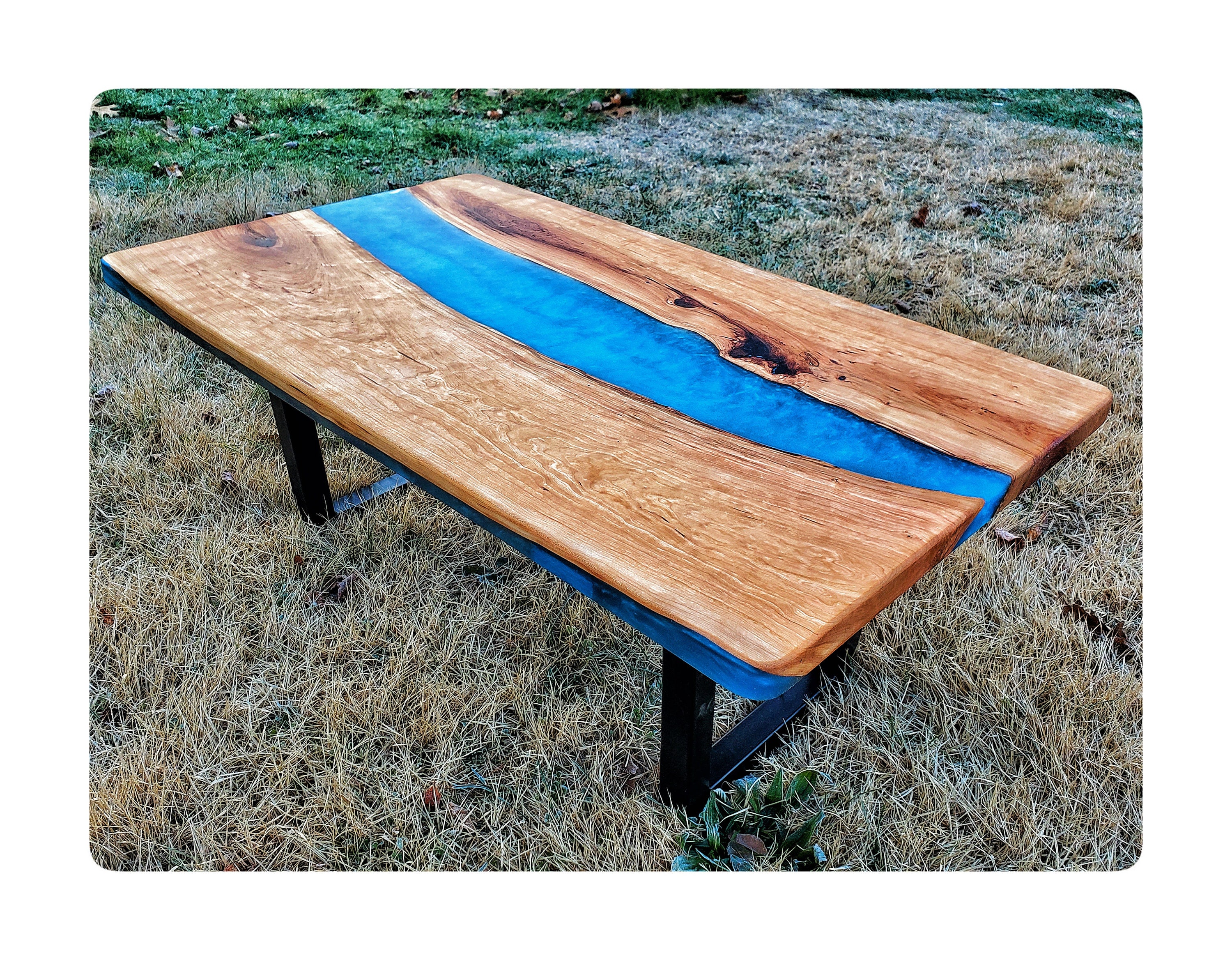 Modern Style Epoxy River Table Featuring Cherry Wood and Live Edge
