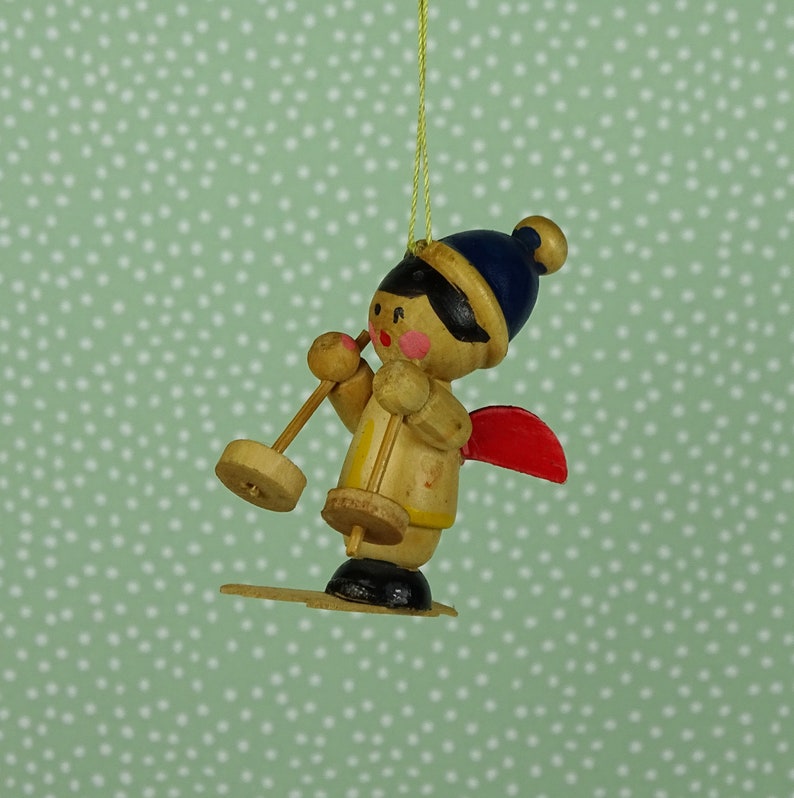 Vintage skiing angel Christmas ornament 1960s wooden blue red