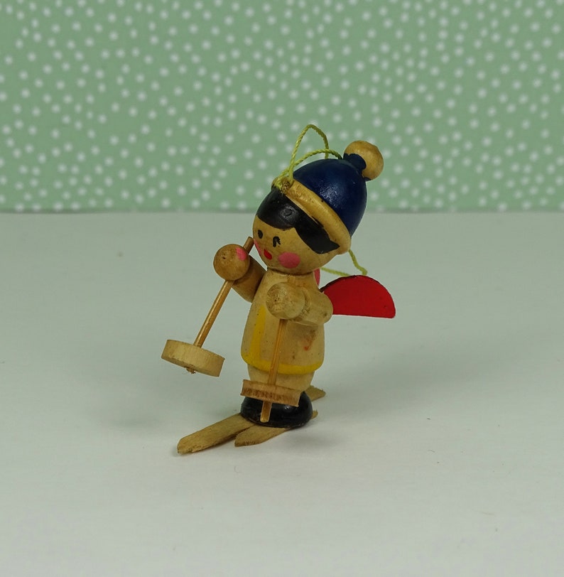 Vintage skiing angel Christmas ornament 1960s wooden blue red