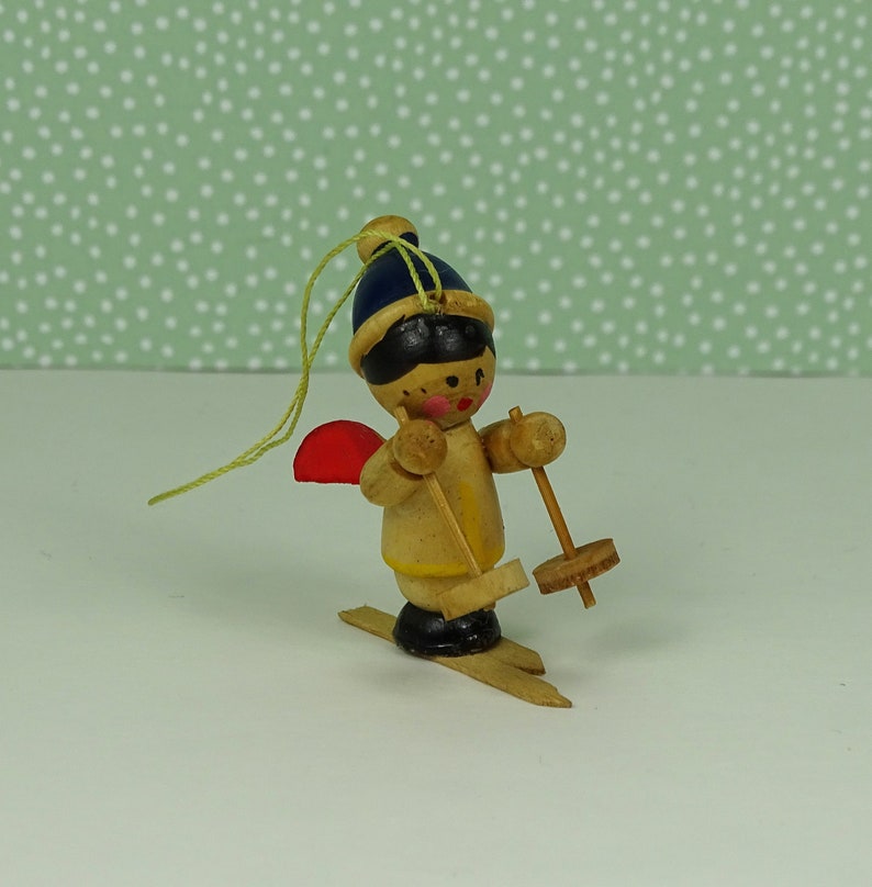 Vintage skiing angel Christmas ornament 1960s wooden blue red