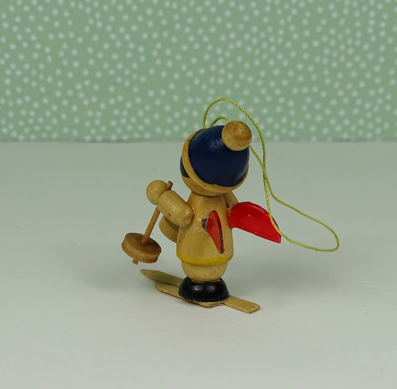 Vintage skiing angel Christmas ornament 1960s wooden blue red