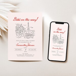 Op de afbeelding: Een roze babyborrel uitnodiging met een zwart-witte illustratie van de Eiffeltoren en bloemen. De tekst luidt "B&eacute;b&eacute; on the way!" en bevat de datum, tijd en locatie van het evenement. De uitnodiging bevat ook de naam "Samantha Johnson" en de tekst "Registered at Amazon.com".
