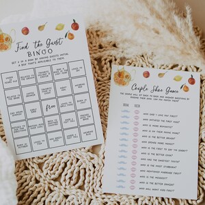 May include: Two printable game cards for a wedding or bridal shower. The first card is a "Find the Guest Bingo" card with a peach, lemon, and pear design. The second card is a "Couple Shoe Game" card with a teapot and fruit design. Both cards have black text.