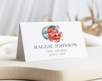 May include: A white place card with a watercolor illustration of a pot of lobsters. The text "Maggie Johnson" is printed in black at the top of the card. The text "fully editable place card" is printed in black below the illustration.