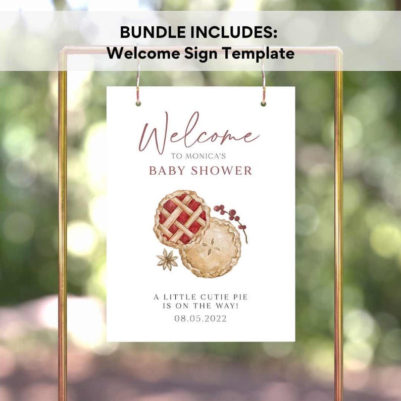 May include: Welcome sign template for a baby shower with a watercolor illustration of two pies. The text reads "Welcome to Monica's Baby Shower. A little cutie pie is on the way! 08.05.2022"