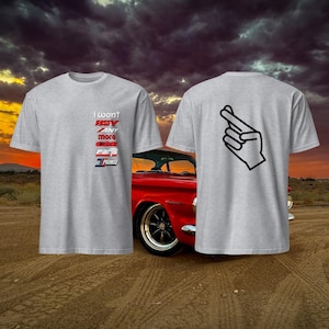 May include: Gray t-shirt with the text "I won't buy any more car parts I promise" in red and blue lettering on the front. The back of the shirt has a black outline of a hand making a pinky promise.