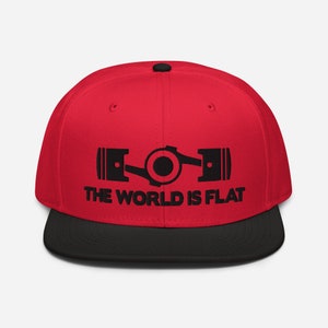 May include: A red and black baseball cap with a black graphic of two pistons and the text "THE WORLD IS FLAT".