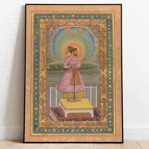 May include: A framed painting of a man in a pink and white patterned robe standing on a platform. The man is holding a small object in his right hand. The painting is surrounded by a gold and green frame with intricate designs.