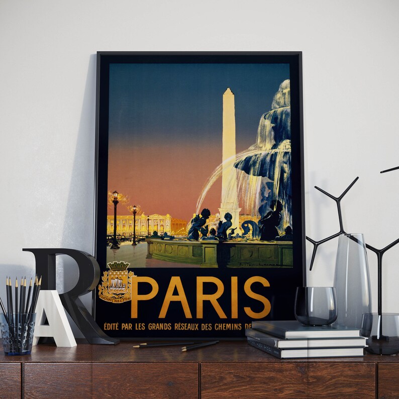 May include: Vintage travel poster featuring a black and white image of a fountain in Paris, France. The poster has a gold background with the word "PARIS" in large, bold, gold letters. The text at the bottom of the poster reads "Edite par les grands reseaux des chemins de fer".