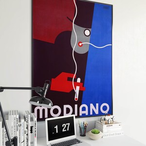 May include: A framed poster with a colorful abstract design featuring a person with a hat and a cigarette. The poster is titled "MODIANO" and has the number "127" printed below the title.