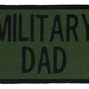 May include: Green military patch with black stitching that reads "Military Dad".