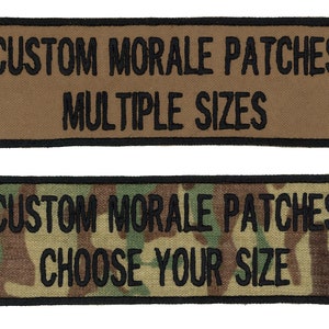 May include: Two brown fabric patches with black embroidered text. The top patch says "CUSTOM MORALE PATCHES MULTIPLE SIZES". The bottom patch says "CUSTOM MORALE PATCHES CHOOSE YOUR SIZE" and has a camouflage pattern.