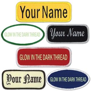 May include: Six different name tag patches with various colors and fonts. The patches are rectangular and oval shaped. The text on the patches reads "Your Name" and "Glow in the Dark Thread".