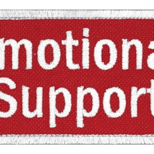 May include: Red rectangular patch with white embroidered text that reads "Emotional Support".