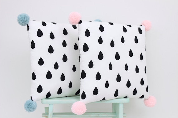Black and white pom pom pillow hotsell