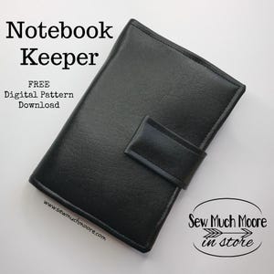 May include: A black rectangular notebook keeper with a textured surface and a central strap closure. The text reads: Notebook Keeper, FREE Digital Pattern Download, www.sewmuchmoore.com, and Sew Much Moore in store with an arrow graphic.