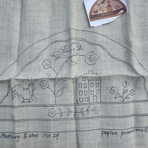 May include: A black and white line drawing on burlap fabric of a house, a bird, a rooster, and flowers. The text "Early Morning 5 Knot 13x24" and "Dayton Primitives © 2006" are visible.
