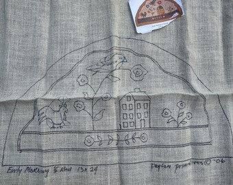 May include: A black and white line drawing on burlap fabric of a house, a bird, a rooster, and flowers. The text "Early Morning 5 Knot 13x24" and "Dayton Primitives © 2006" are visible.