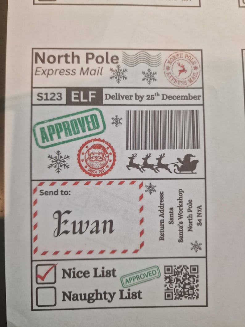 May include: A festive North Pole Express Mail label with the name "Ewan" in elegant script. Features "Approved" stamps, snowflakes, and a Santa Claus graphic. Includes a "Nice List" checkmark and a barcode.