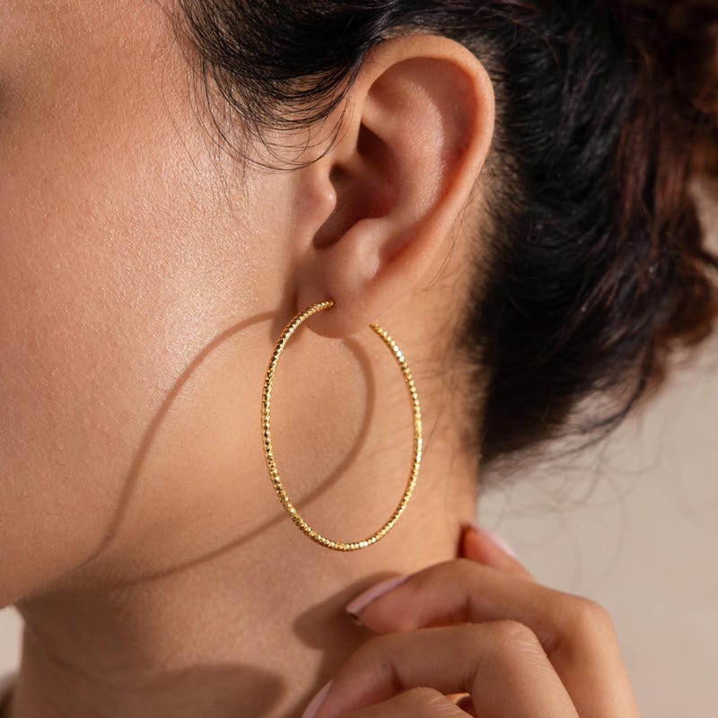 Textured woven hoop earrings with abstract tips – Nasdol