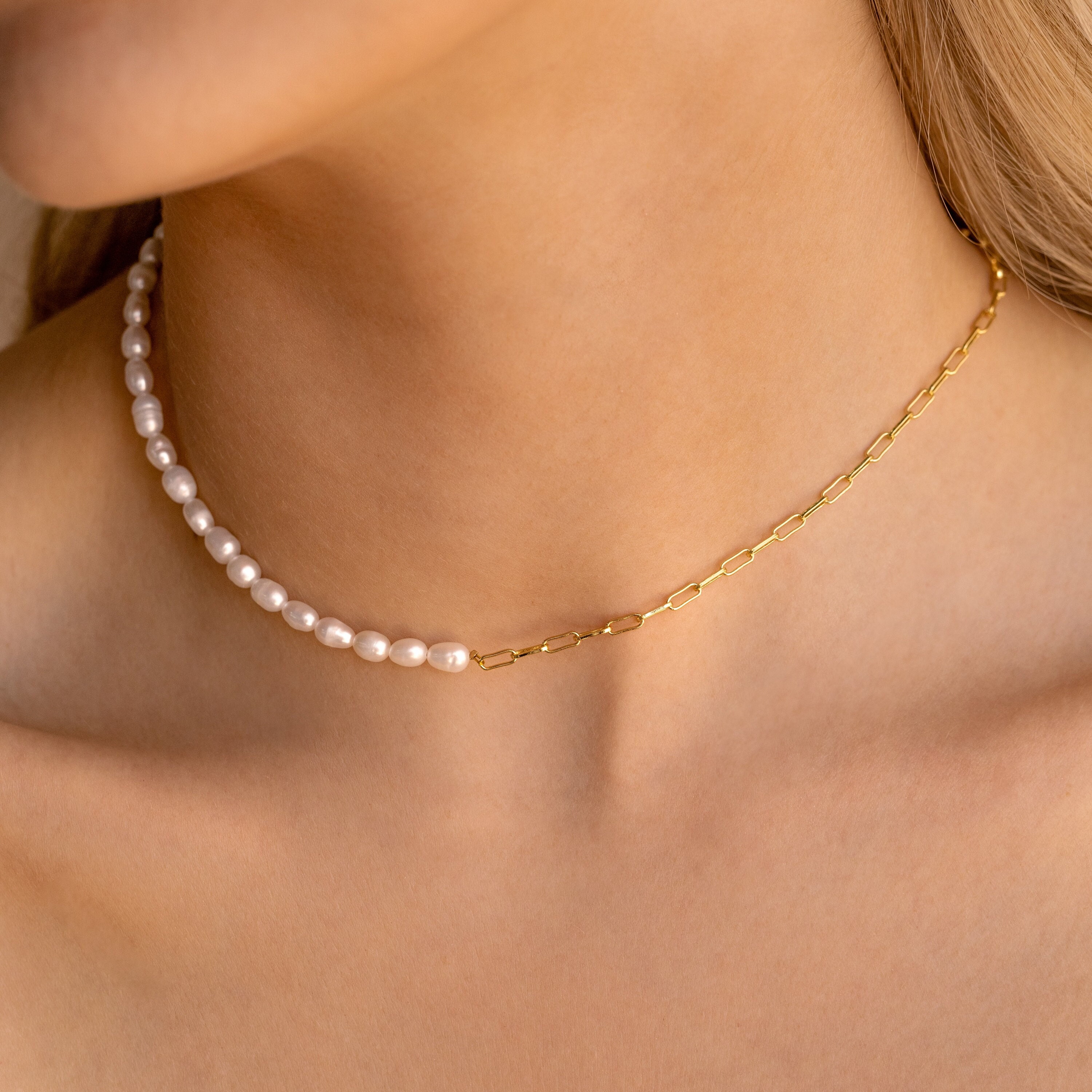 Two strand cultured pearl necklace, clasp 18K gold with half pearl and  eight cut diamonds. - Bukowskis