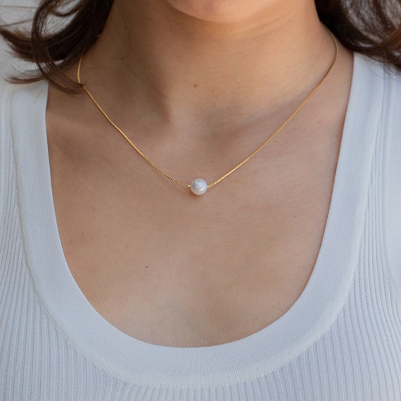 Pearl shop solitaire pendant