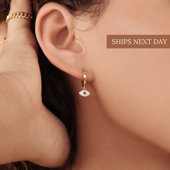 Trendy evil eye nazariya earrings for women in silver. Shop now