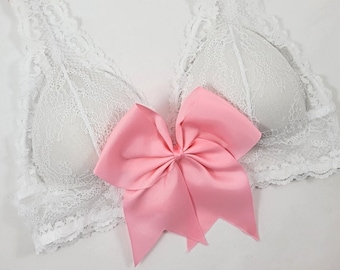 Pink oversized bow bra top.