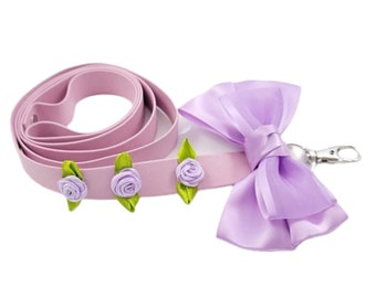 Pastel pink and purple bow and flowers leash.
