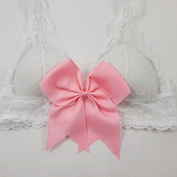 Pink oversized bow bra top.