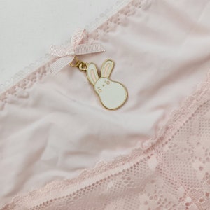 Pastel pink clip on bunny tail panties. image 3