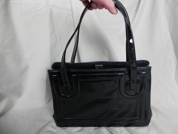 black and beige handbag