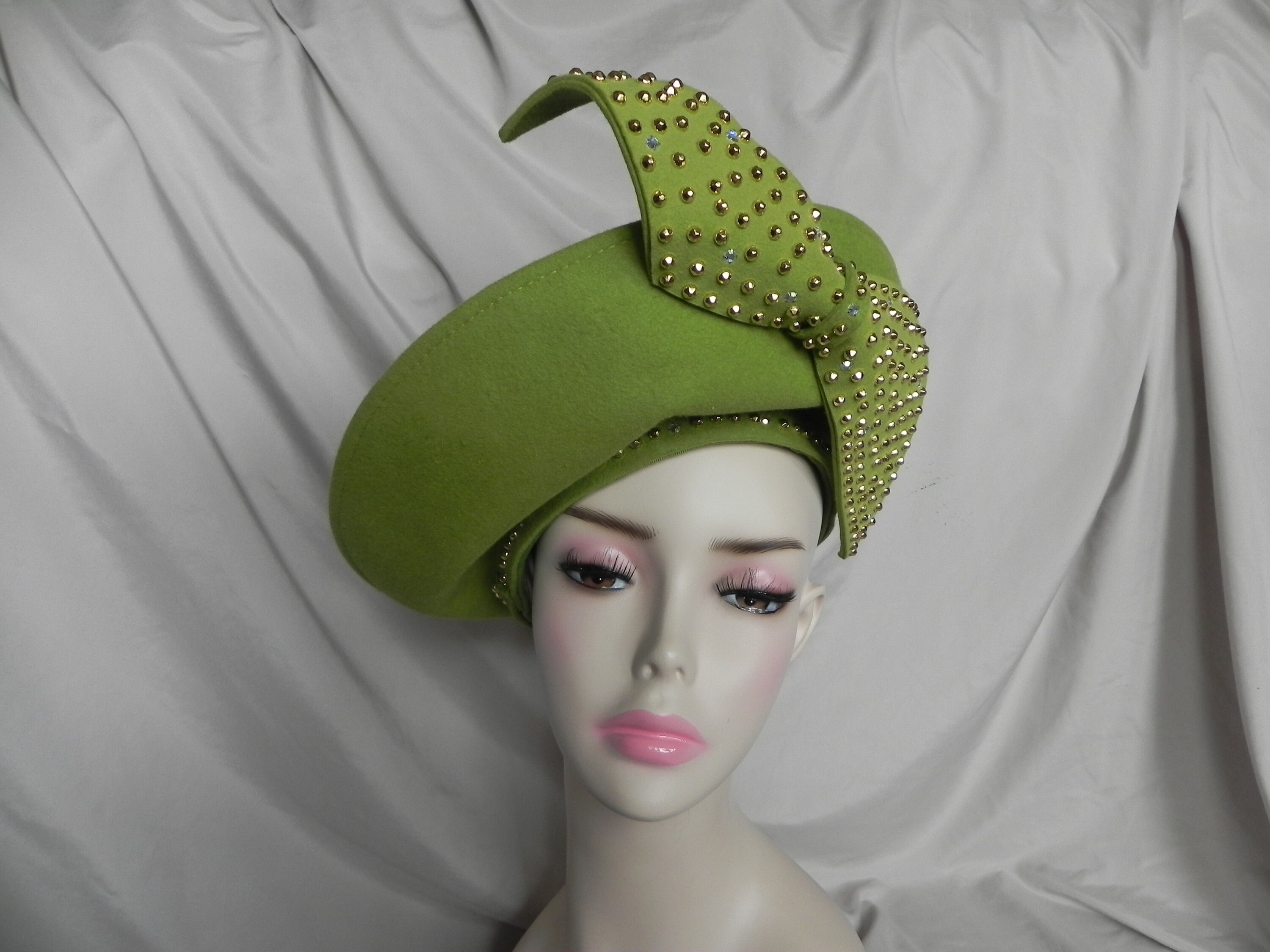 green felt derby hat