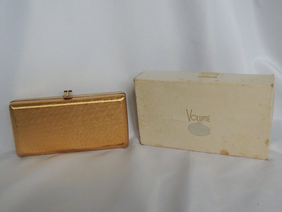 Gold hard hotsell clutch