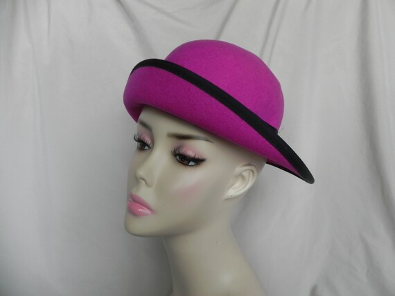 pink bowler hat