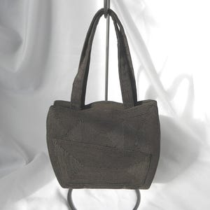 Bolso de mano Corde' de tres compartimentos en marrón oscuro con bolsillo delantero