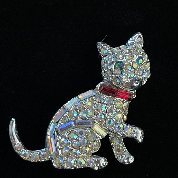 Unsigned bling cat brooch silver tone.