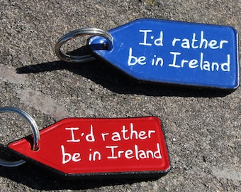 Rather be.....  leather keychain. Hand-painted.