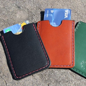 Creditcardbewijs: handgestikt leer.
