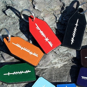 Personalised Ogham leather keychains. Ancient Irish writing. Custom made